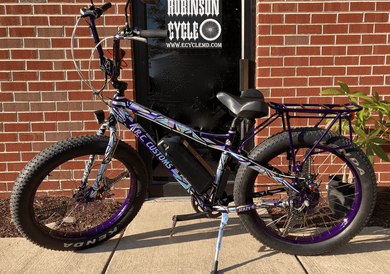 Colorful mountain bike outside shop