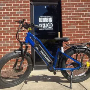Fat tire e-bike outside brick building