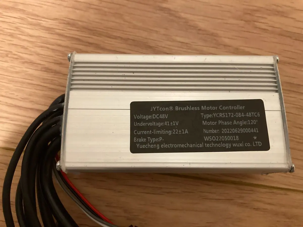 Brushless motor controller on wooden surface