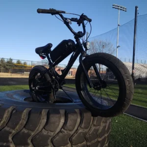 E-bike showcased on giant rubber tire