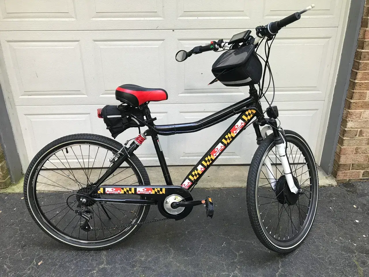Black electric bike with Maryland flag design