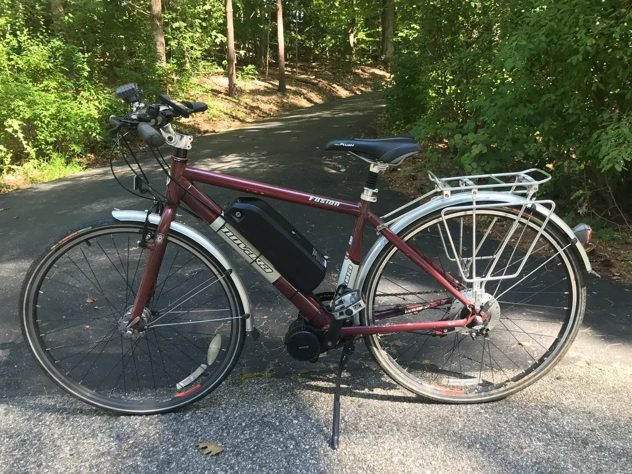 Electric bike parked in wooded area