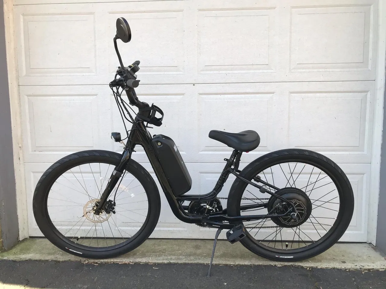 Side view of sleek electric bicycle.